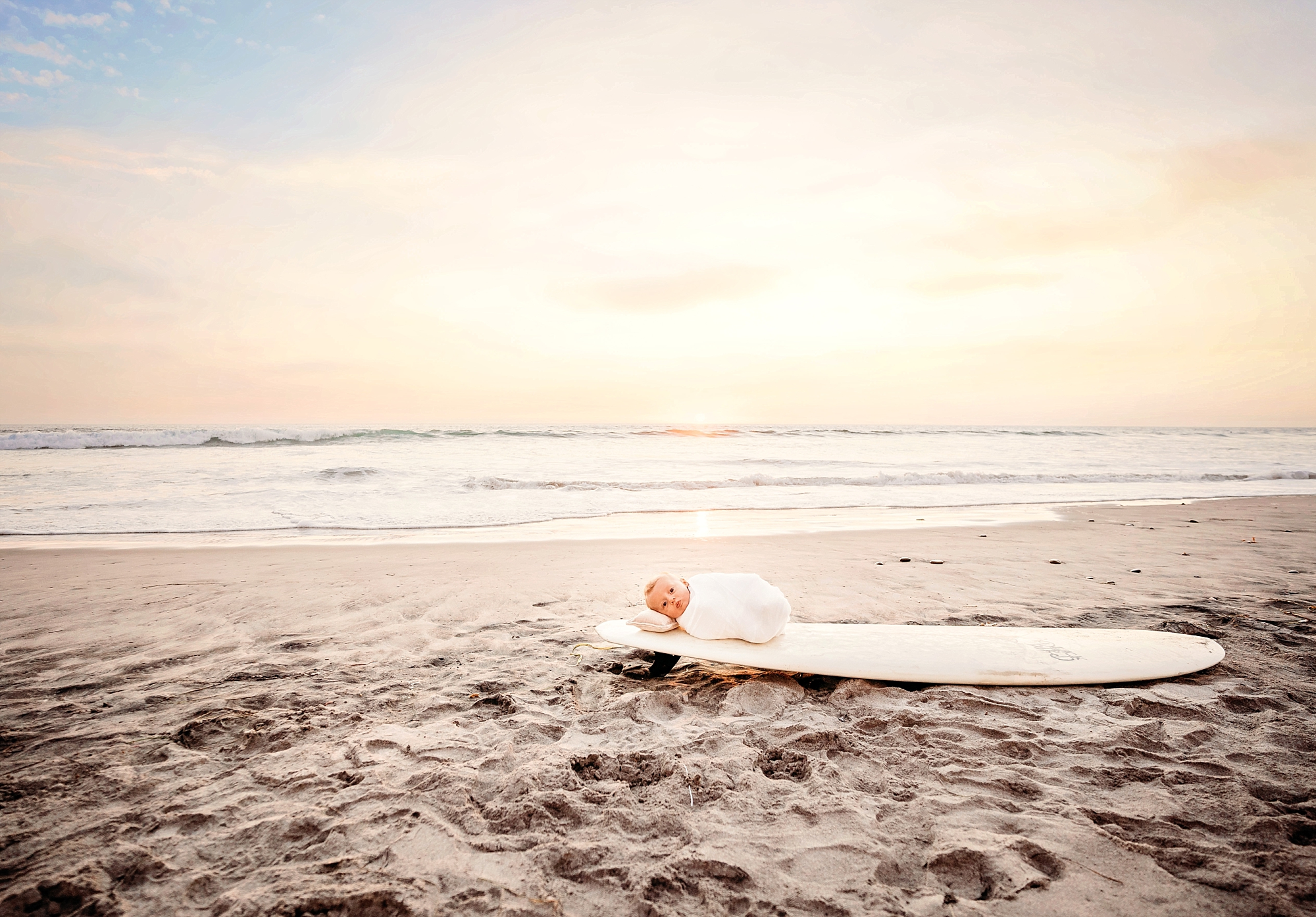 Newborn on a beach portrait photo session by Tristan Quigley Photography
