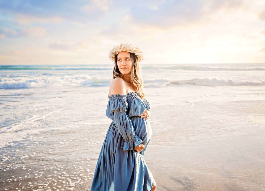 Beautiful pregnant mother on the beach during her session with San Diego pregnancy photographer, Tristan Quigley