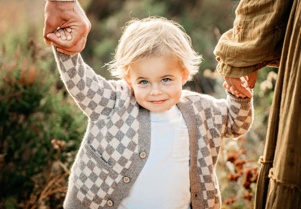 Adorable little boy during his fall family photography session with Tristan Quigley Photography. 