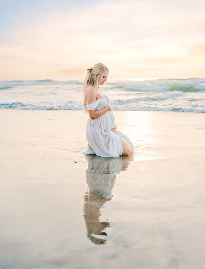 10 Essential Tips to Prepare for Your Carlsbad Maternity Photography Session 3 Timeless couple maternity portrait at Encinitas beach location